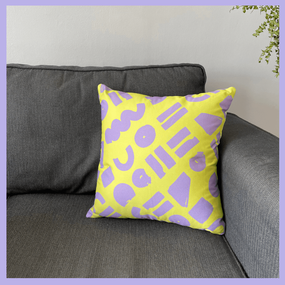 Love - yellow and lilac geometric printed cushion