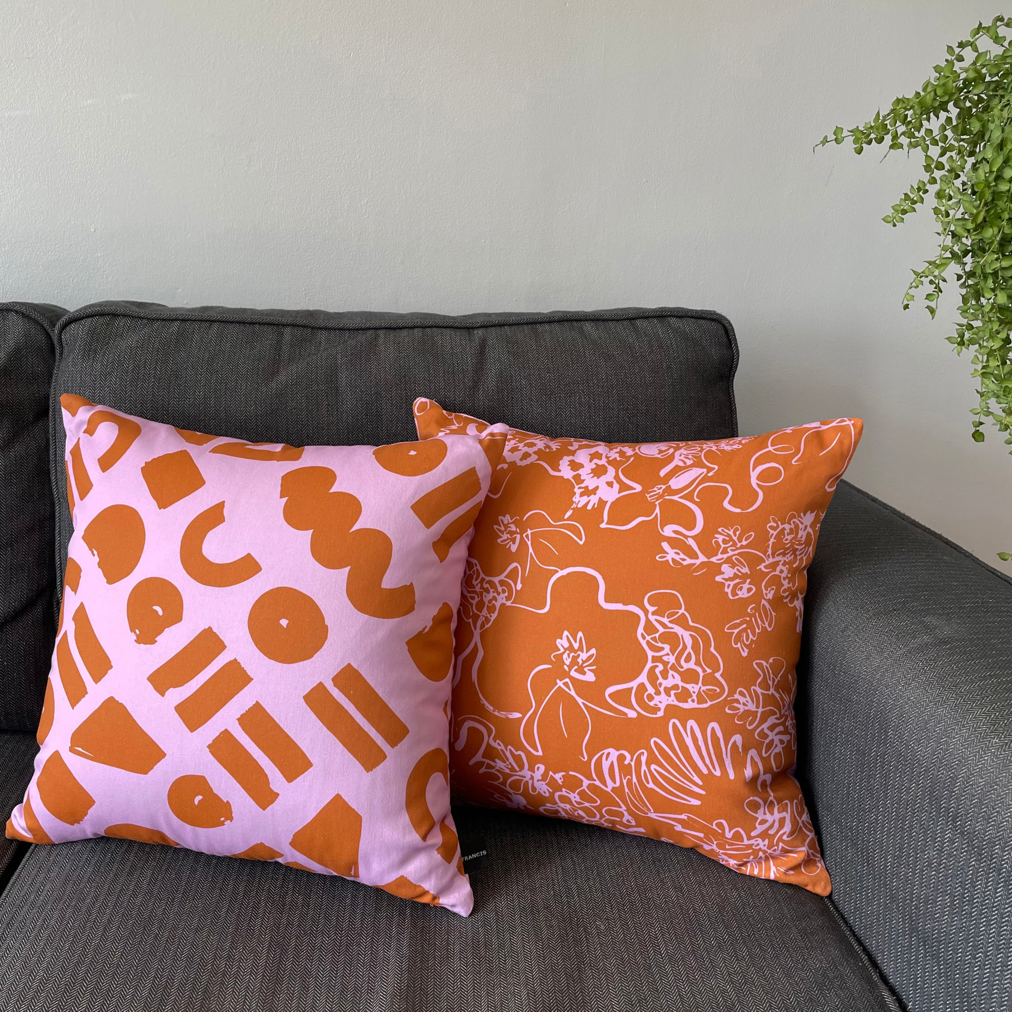 Love - pink and ocher geometric printed cushion