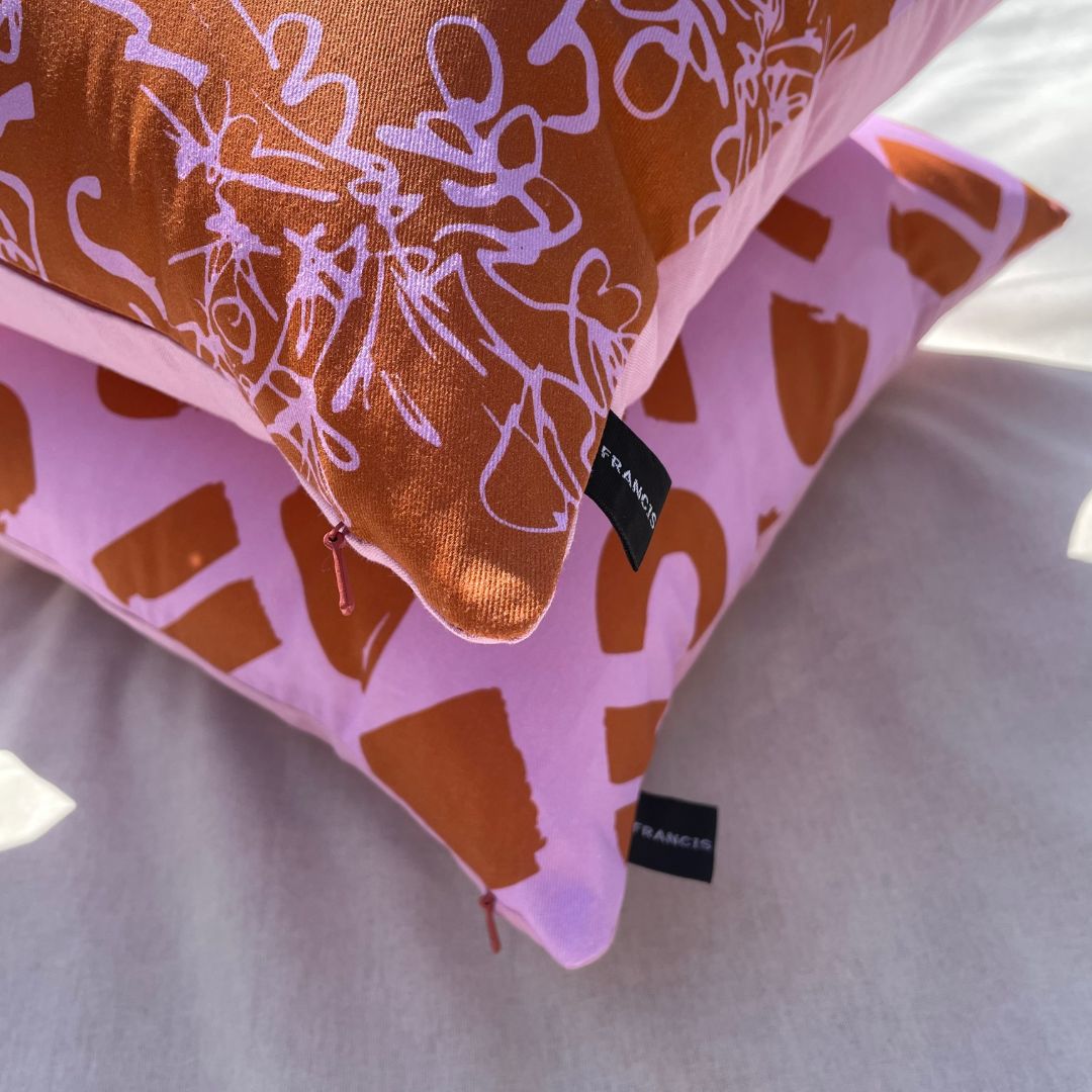 Love - pink and ocher geometric printed cushion