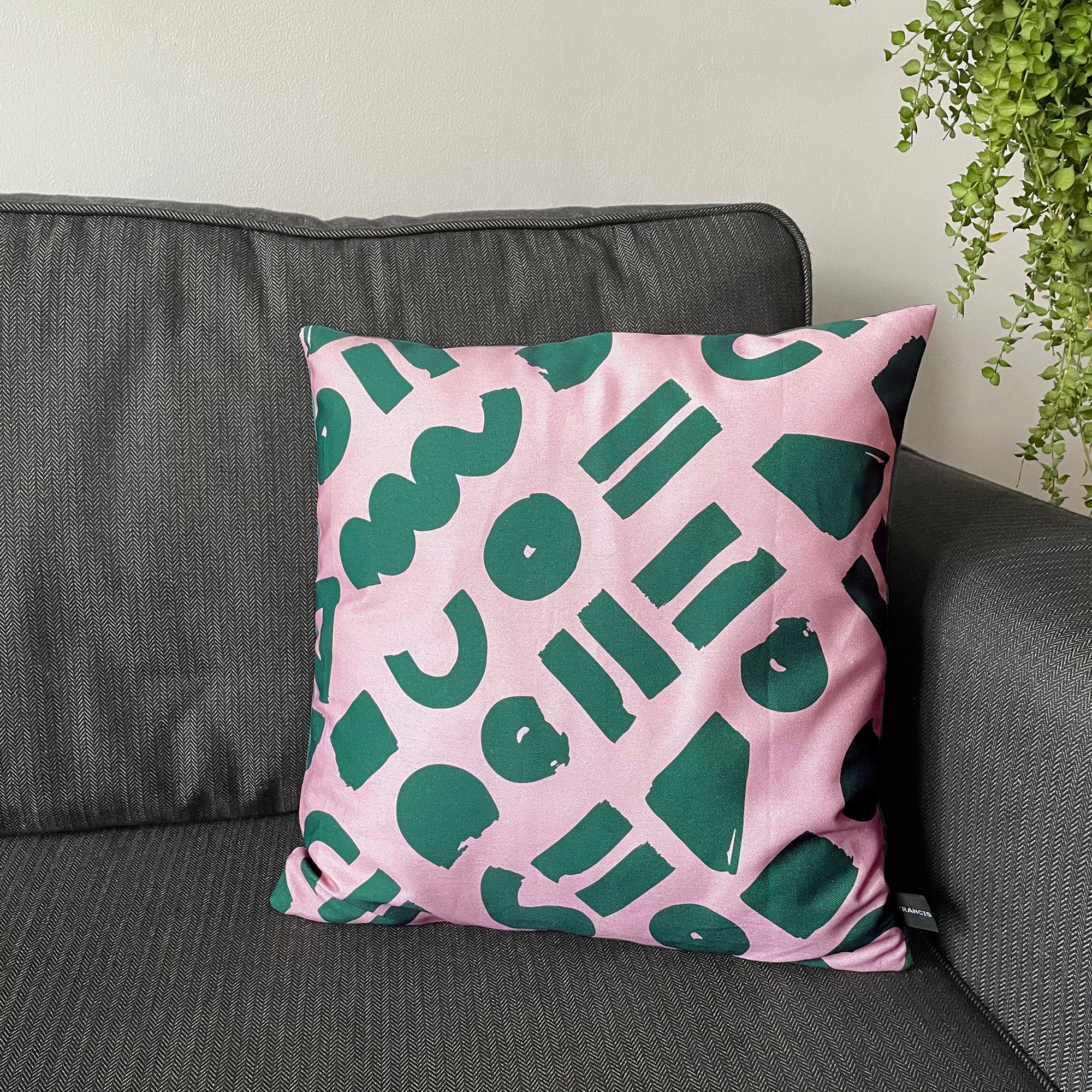 Love - pink and green geometric printed cushion