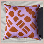 Love - pink and ocher geometric printed cushion